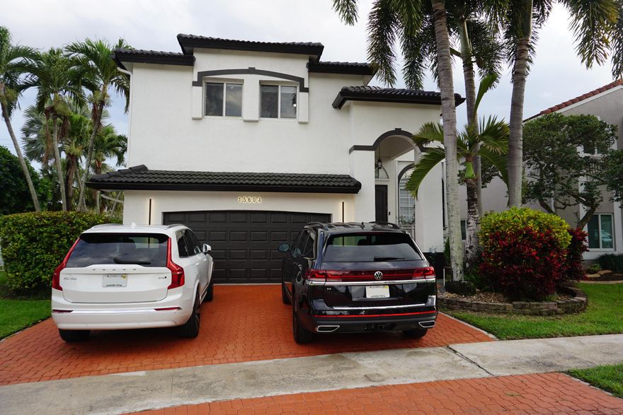 Entertainer's dream backyard on oversized ¼-acre lot!  Featuring your very own water system heated pool, large paver patio, equipped with awnings and exterior lighting. This beautiful 5-bedroom, 3-bath home in Grove Estate sits within the sought-after Grand Palms golf community. All flooring has been upgraded porcelain tile flooring, marble stairs and laminate flooring. The open first floor offers vaulted ceilings, neutral finishes, and new window treatments in the living and dining rooms. The spacious master suite includes a walk-in closet and a newly renovated master bath with a large shower and soaking tub—an ideal retreat after a long day. Highlights: upstairs loft, new roof (2018), updated electrical panel (2020). HOA covers cable/internet, lawn care, and 24-hour gated entrance.