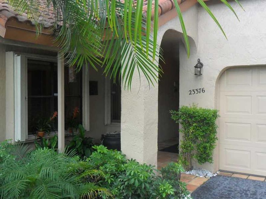 Waterside at Boca Trail is a private, gated, secure community with tennis, pool and Ocean access docks! Three bedroom home has oversized open floor plan, eat-in kitchen, dining room, cathedral ceilings, huge living area opening to screened Mexican tile la nai and pool. Only a few steps thru yard to your own dock for 26' boat. Full attic above 2 car garage with extra side room for arts, shop, your choice. Newer roof, master bath, shutters, washer & dryer. Sold AS IS, Price reduced. Must see this gem!