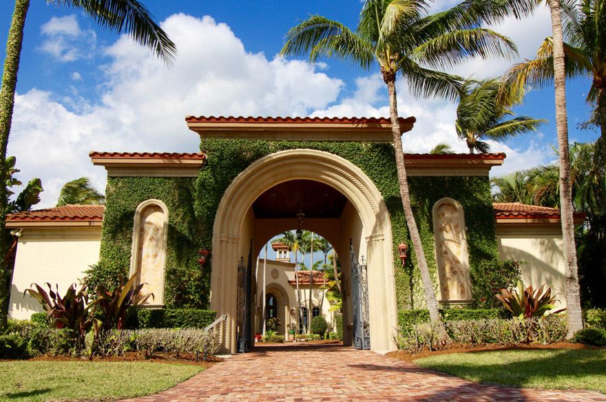 Stunning 5 bedroom, 5 bath, 3 car garage olde world estate. Extremely private and elegantly appointed this home boasts 100' of  direct Intracoastal waterfront and unobstructed ocean access. The dockage is suitable for up to an 80' vessel. New roof in the last 2 years; new paint inside and out; and new appliances. This immaculately maintained home is a luxurious, elegant, privately gated manor. Interior details include stunning wood ceilings detailing, extensive moldings, wine cellar, stunning formal dining room and a gourmet kitchen. First floor master is private and expansive and the adjacent den/office is extremely well finished with additional wood detailing. Wide views from the outdoor loggia and pool area are panoramic and spectacular! This estate has a guest house and a