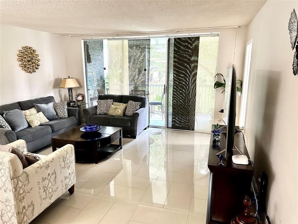 Photo of 3000 S Course Drive #201, Pompano Beach, FL 33069 (MLS # F10549608)