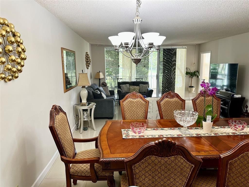 Photo of 3000 S Course Drive #201, Pompano Beach, FL 33069 (MLS # F10549608)