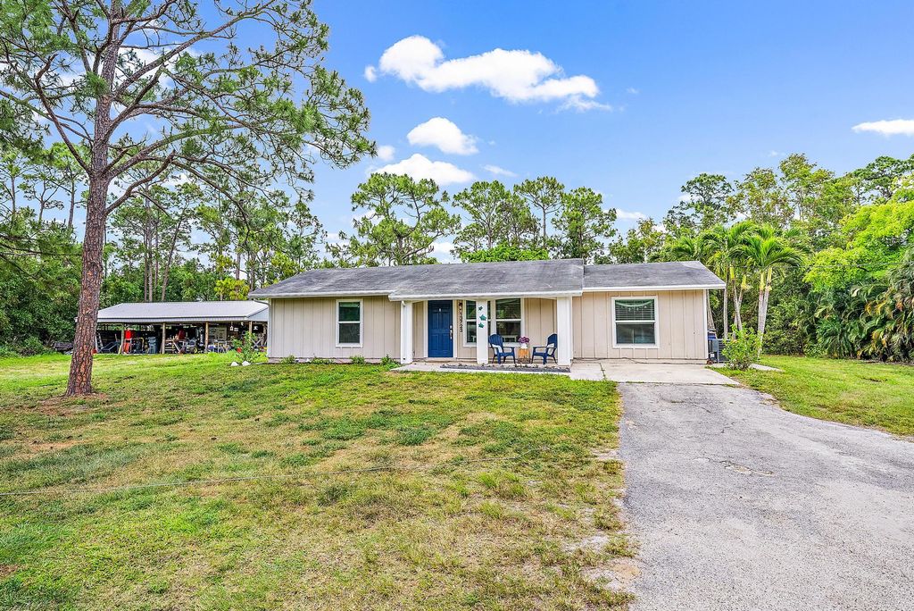 Photo of 13723 158th Street N, Jupiter, FL 33478 (MLS # R10978315)