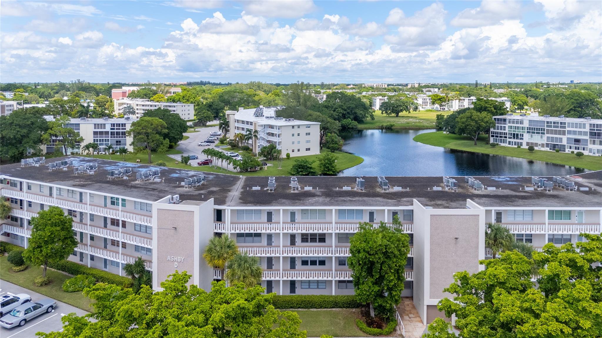GREAT LOCATION! 3RD FLOOR WATER VIEW CONDO ONLY A FEW STEPS FROM SWIMMING POOL. LARGE FLORIDA ROOM. WOOD FLOORS THROUGHOUT. NEW RANGE FAN. VERY CLEAN AND READY TO MOVE IN. FURNISHED. ROOF IS ONLY 2 YEARS OLD! TWO ELEVATORS, UPDATED LAST YEAR. COMMON LAUNDRY ROOM WITH NEW FREE MACHINES. ONLY 3.5 MILES TO THE BEACH! CENTURY VILLAGE HAS SO MUCH TO OFFER: FREE TRANSPORTATION TO SHOPPING PLAZAS, TENNIS COURTS, FITNESS CLUB, INDOOR AND OUTDOOR SWIMMING POOLS. LOOKING FOR A 5-STAR RESORT.