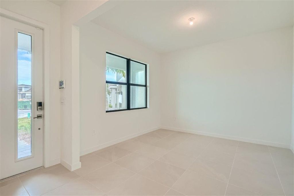 Photo of 2034 NE Ocean Dunes Drive, Jensen Beach, FL 34957 (MLS # R10930128)