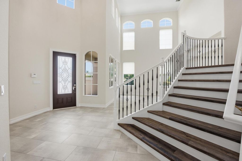 Photo of 11788 Knightsbridge Place, Wellington, FL 33449 (MLS # B26019419)