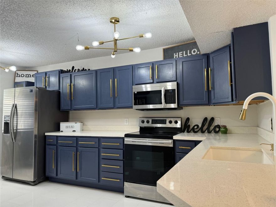 Beautifully highly upgraded 3 bedroom 2 bath condo in a resort like community.  As you walk in you will immediately see the $35K worth of upgrades including all new white porcelain  flooring throughout.  The kitchen is stunning with refinished blue cabinets, with quartz countertops, gold fixtures, sputnik chandeliers, stainless steel appliances, and LED cabinet lighting. Both bathrooms are brand new with LED Lit mirrors and matching white tile everywhere.  Bedrooms have remote ceiling fans and custom closets.  Laundry room has high efficiency washer and dryer with lots of storage.  Too much to list must see immediately!Owner requires: drivers license pic of all Tenants and 1 month paystubsAssociation requires: minimum credit score 600 all applicants and pass nationwide background.