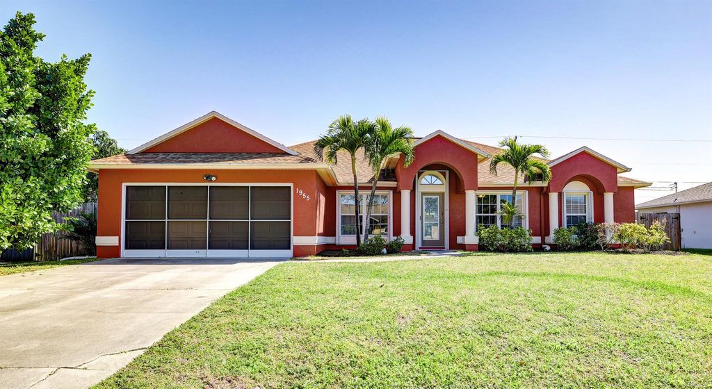 Photo of 1955 SW Ember Street, Port Saint Lucie, FL 34953 (MLS # R10960600)