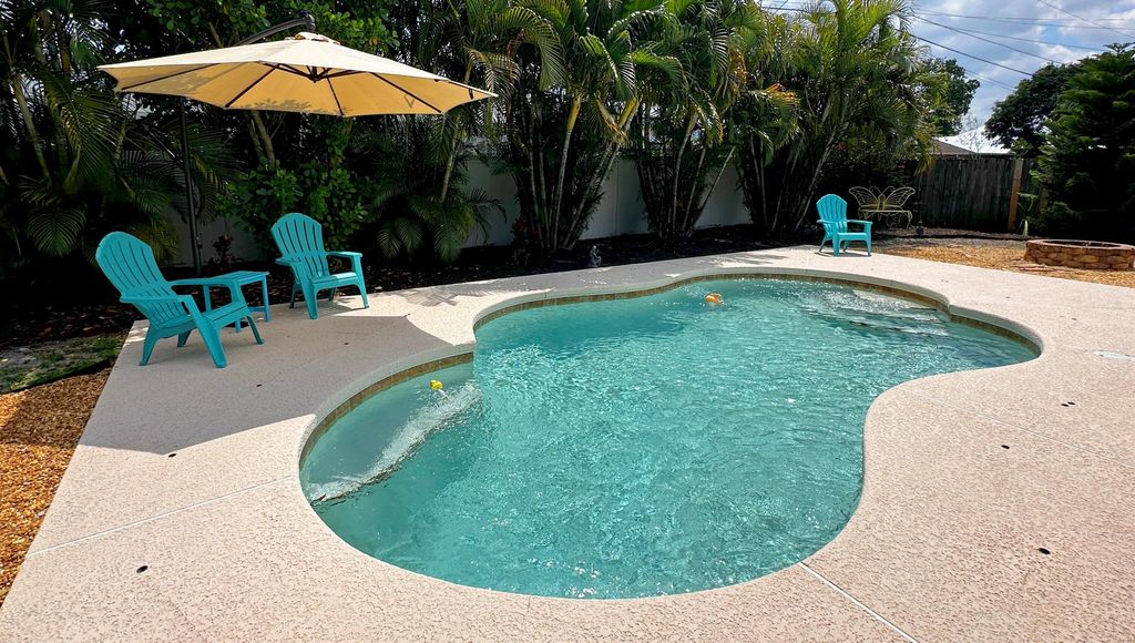 Photo of 1955 SW Ember Street, Port Saint Lucie, FL 34953 (MLS # R10960600)