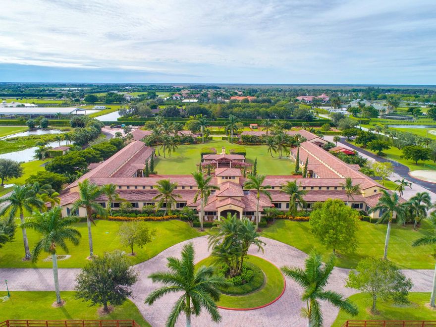 This impeccable 62-acre equestrian compound in heart of Wellington is located within minutes of the Winter Equestrian Festival, Global Dressage Festival, and International Polo Club. Completed in 2005 with top notch facilities for Hunter/Jumper. Polo activities this farm is ready for occupancy.The polo area barn is shaped as a square with 20 stalls in each row for a total of 60 stalls centered around a courtyard with sitting area, summer kitchen and Asado grill. In close proximation are 2 regulation size Polo fields with 1/2 mile exercise track. Celebration Grassland and a grandstand with fitness center & bathrooms. Additional features include 6 tack rooms, 4 feed rooms, wet fly spraying system and aquatic horse walker. Large car collectors garage.