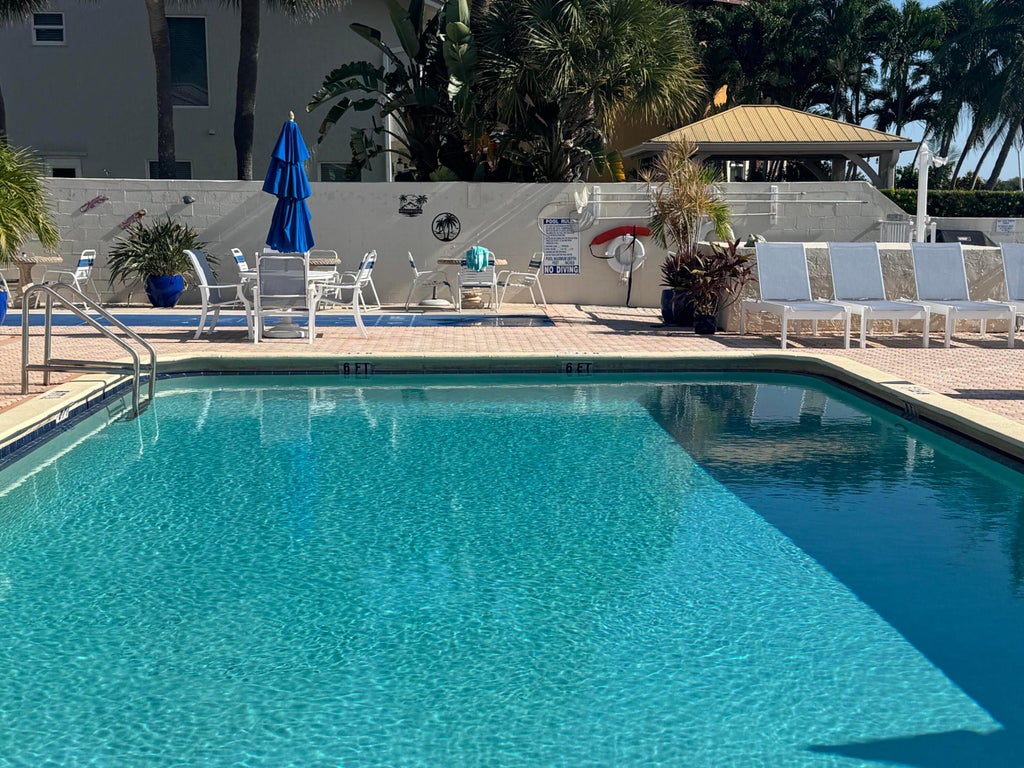 Photo of 600 SNUG HARBOR Drive #A10, Boynton Beach, FL 33435 (MLS # B26074608)