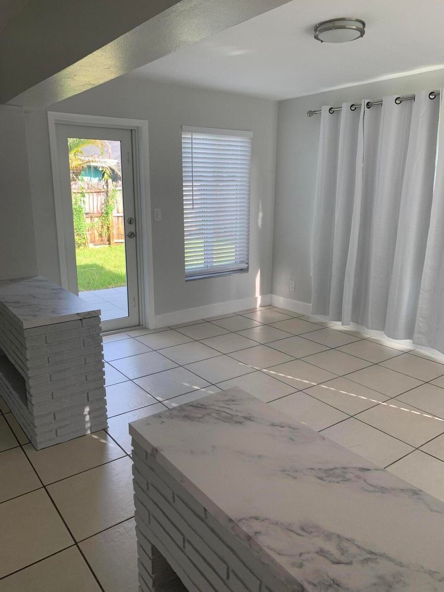 2 Bedroom one bath home. carport , fenced yard, washer dryer, family  room. close to shopping, restaurants. easy access to 95. residential neighborhood and location close to grocery, restaurants, shopping.