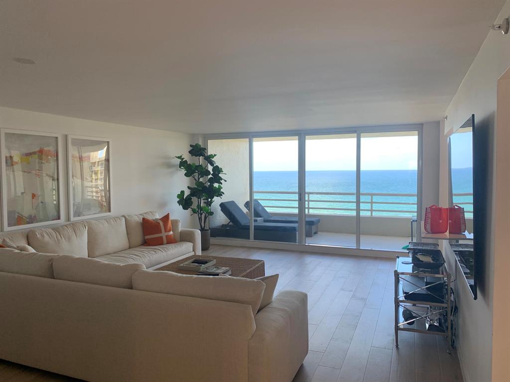 Penthouse unit in most desirable D building at Sea Ranch Club. Coveted Champagne model with breathtaking unobstructed panoramic ocean and intracoastal views. Unit was completely renovated in 2022. White oak wood flooring throughout with custom modern cabinetry and built in refrigerator. Master bath has been reconfigured to include oversized shower. Master suite has walk-in closet and 2 additional closets.