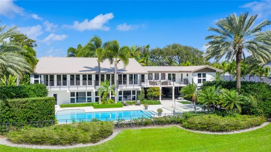 Located directly on the 9th hole of Coral Ridge Country Club, this property is truly one of a kind. You will not find this floor plan, level of finishes or exterior living component anywhere else in Fort Lauderdale.  Fully renovated from 2017-2019, including features such as: a full house generator (500 Gal Tank), Leviton Smart Home System (audio, lighting & a 16 camera security system), Somfy automatic window blinds, Wolfe appliances, Sub Zero refrigerator, Sub Zero wine cooler, Sub Zero beverage cooler, oversized master with a breakfast bar and washer/dryer.7 AC units (5 in main house, 1 in guest house & 1 in garage) & a charging station inside the garage, Eco friendly automatic mosquito control system, armor mesh hurricane protection and so much more. Must see to appreciate fully. .