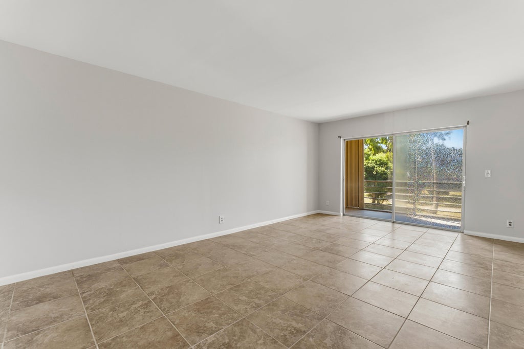 Photo of 1638 EMBASSY Drive #208, West Palm Beach, FL 33401 (MLS # B26072911)