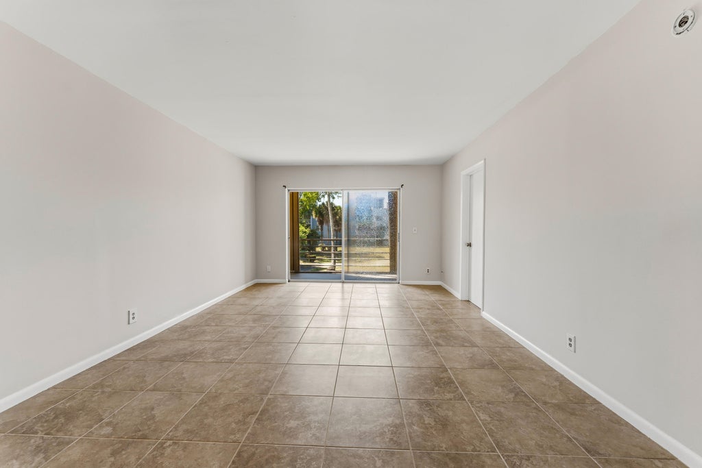 Photo of 1638 EMBASSY Drive #208, West Palm Beach, FL 33401 (MLS # B26072911)