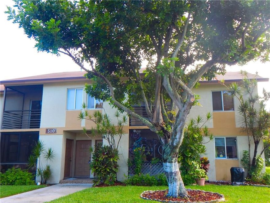 2 bedrooms PLUS an office/den and 2 full bathrooms. Beautiful second floor condo with new wood laminate flooring throughout the living areas and bedrooms and remodeled bathrooms. Screen enclosed patio, Washer/Dryer in unit. Maintenance fee includes exterior insurance, building reserves, trash and all amenities including pool, sauna, gym, tennis courts, basketball court, jogging trail, and clubhouse.  You can Lease right away! Lender approved financing with as little as 3% down! Dogs up to 40 lbs