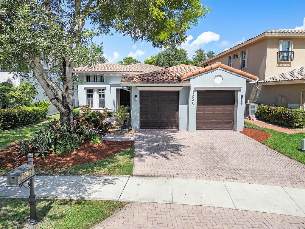 Photo of 10575 NW 83rd Court, Parkland, FL 33076 (MLS # F10529540)