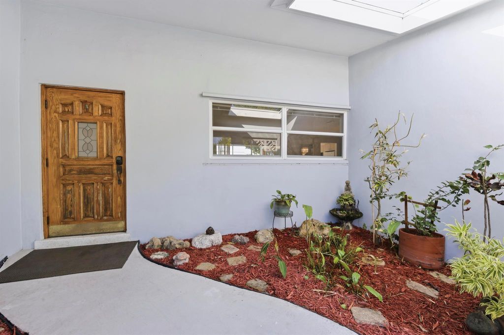 Photo of 3840 Buttercup Circle N, Palm Beach Gardens, FL 33410 (MLS # R11142778)