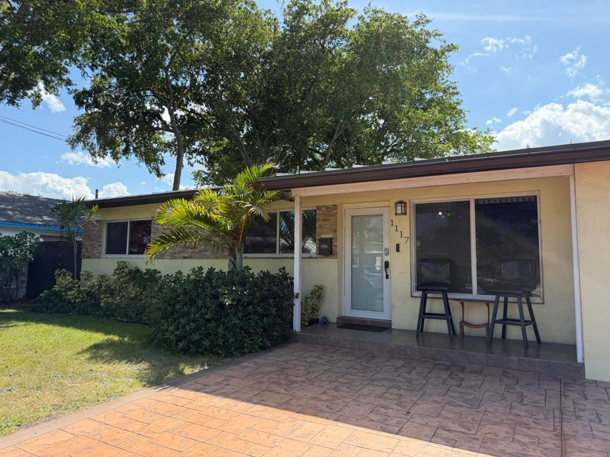 Investor-friendly property with outstanding income potential in the Riverland area of Fort Lauderdale. This updated home offers multiple living spaces ideal for multigenerational living, Airbnb, or annual rentals. The main home features 3 bedrooms, 2 baths, an updated kitchen with a large island, and an enclosed Florida room with access to a third full bath. A private-entry studio with its own bathroom and an additional attached 2-bedroom structure create flexible options for extended family or rental income. The oversized fenced yard offers room for a pool. Features include a 2023 metal roof, impact windows, tile flooring, and an EV charging station. Conveniently located near major highways, shopping, dining, and local attractions.