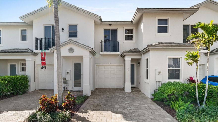 Beautifully updated 3-bedroom, 3 full-bath townhome located in a newer 2019-built community in the heart of Coconut Creek. This spacious home features a full bedroom and bathroom on the first floor, perfect for guests. Enjoy newer wood flooring on the stairwell and throughout the upstairs, with durable ceramic tile downstairs. The upstairs laundry adds everyday convenience. Situated in a gated community with very low HOA fees, this property is just minutes from shopping, dining, entertainment, and beaches. Excellent opportunity for investors with no rental restrictions. Located next to A+ rated private and public schools. A must-see home in a prime location!
