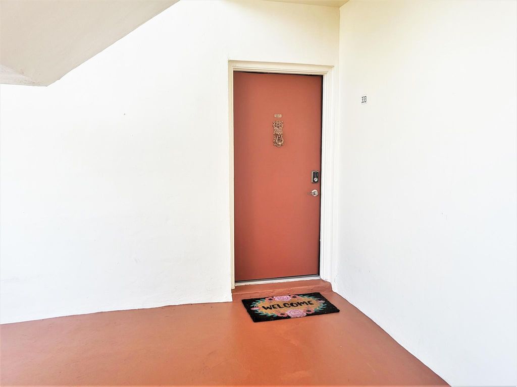 Photo of 333 Lake Dora Drive, West Palm Beach, FL 33411 (MLS # R10913344)