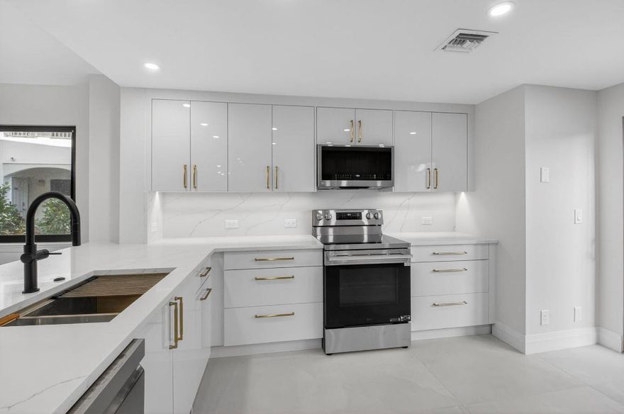 Meticulously upgraded, vibrant first floor 2 bedroom 2 bath condo expanded with approximately 1700 sq. ft. of living area. Our premier builder has done it again. Completely Renovated with impact windows, copper pipes, all new kitchen including appliances,
cabinets, open to dining area and great room. Club has world class amenities including 3 restaurants, 3 bars, fitness center and spa, 8 pools, 18 tennis courts, 8 pickleball courts and much more.