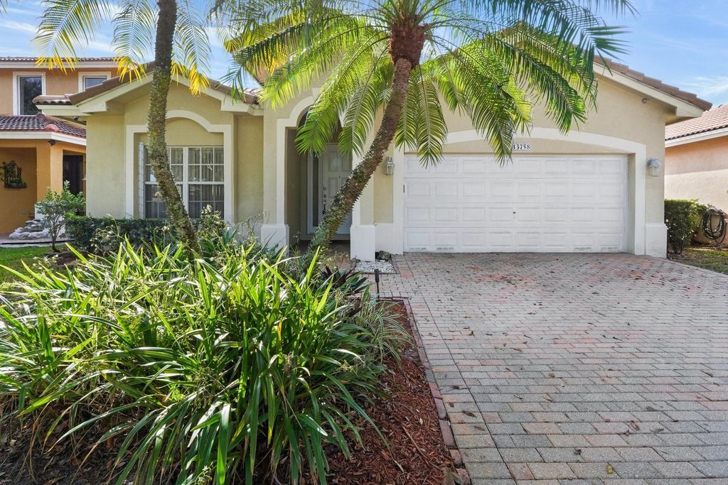 Photo of 13758 SW 31st St, Miramar, FL 33027 (MLS # F10540888)