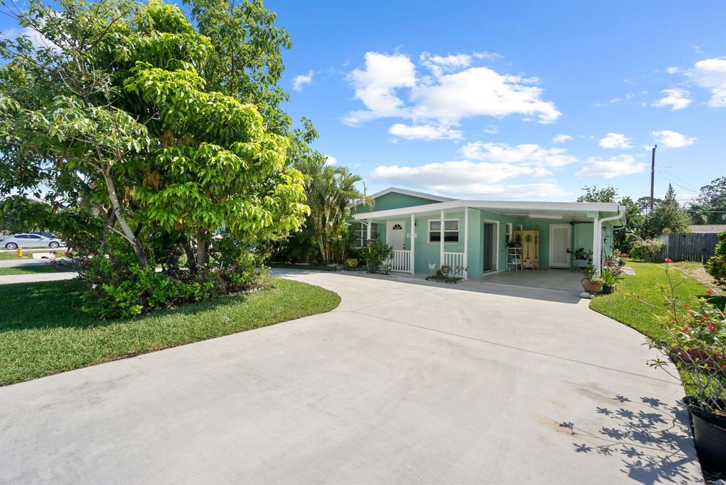 Photo of 5657 SE Avalon Drive, Stuart, FL 34997 (MLS # R10888239)