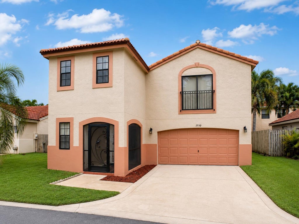 Photo of 1710 Shoreside Circle, Wellington, FL 33414 (MLS # B26053697)