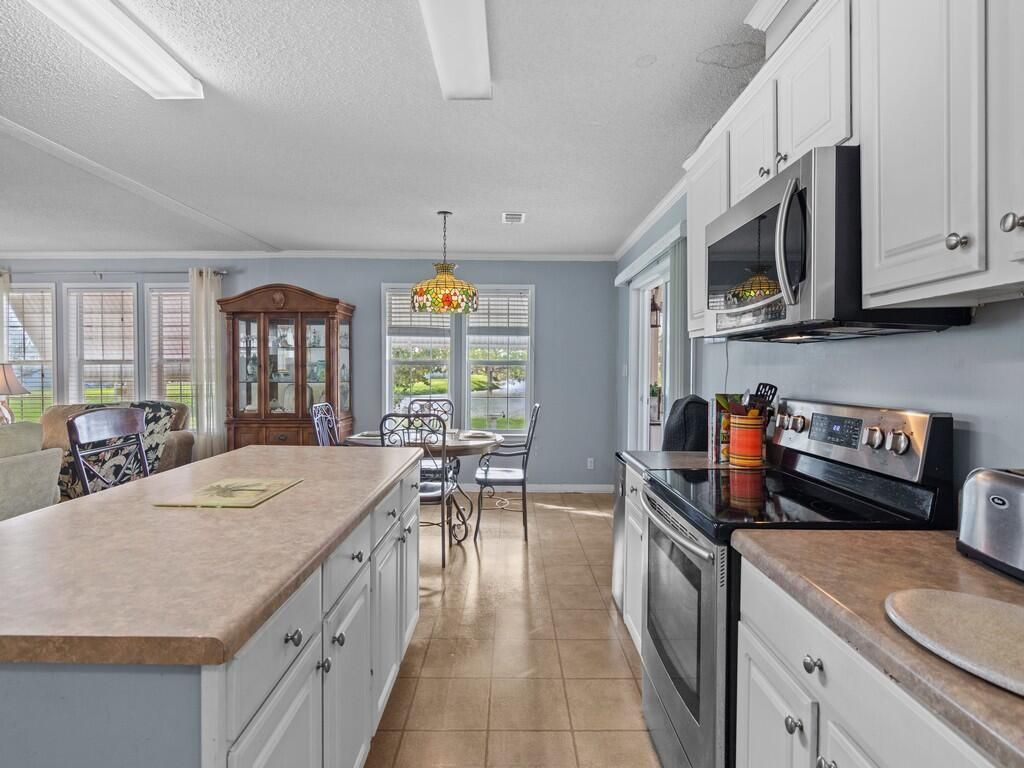 Photo of 59 Mediterranean East Boulevard E, Port Saint Lucie, FL 34952 (MLS # R10947880)