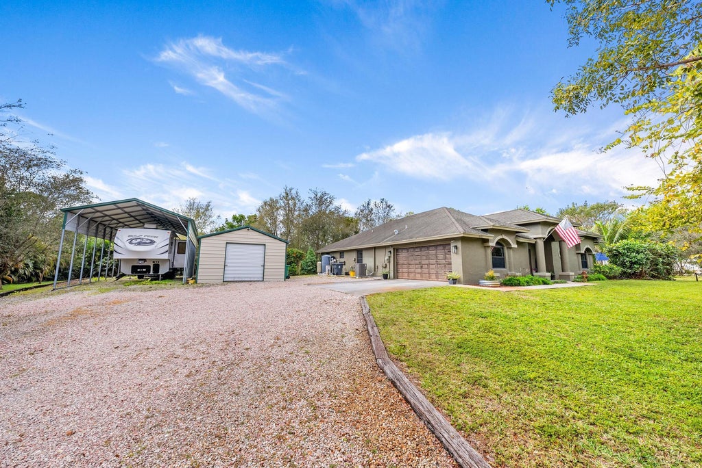 Photo of 16682 66th Court N, The Acreage, FL 33470 (MLS # R10964749)