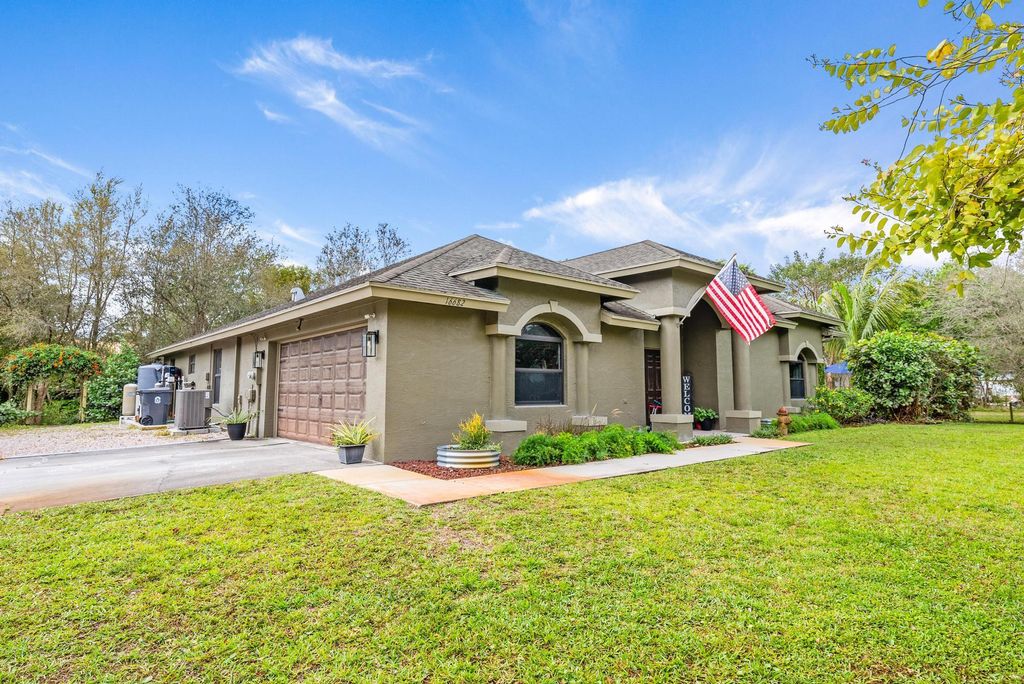 Photo of 16682 66th Court N, The Acreage, FL 33470 (MLS # R10964749)