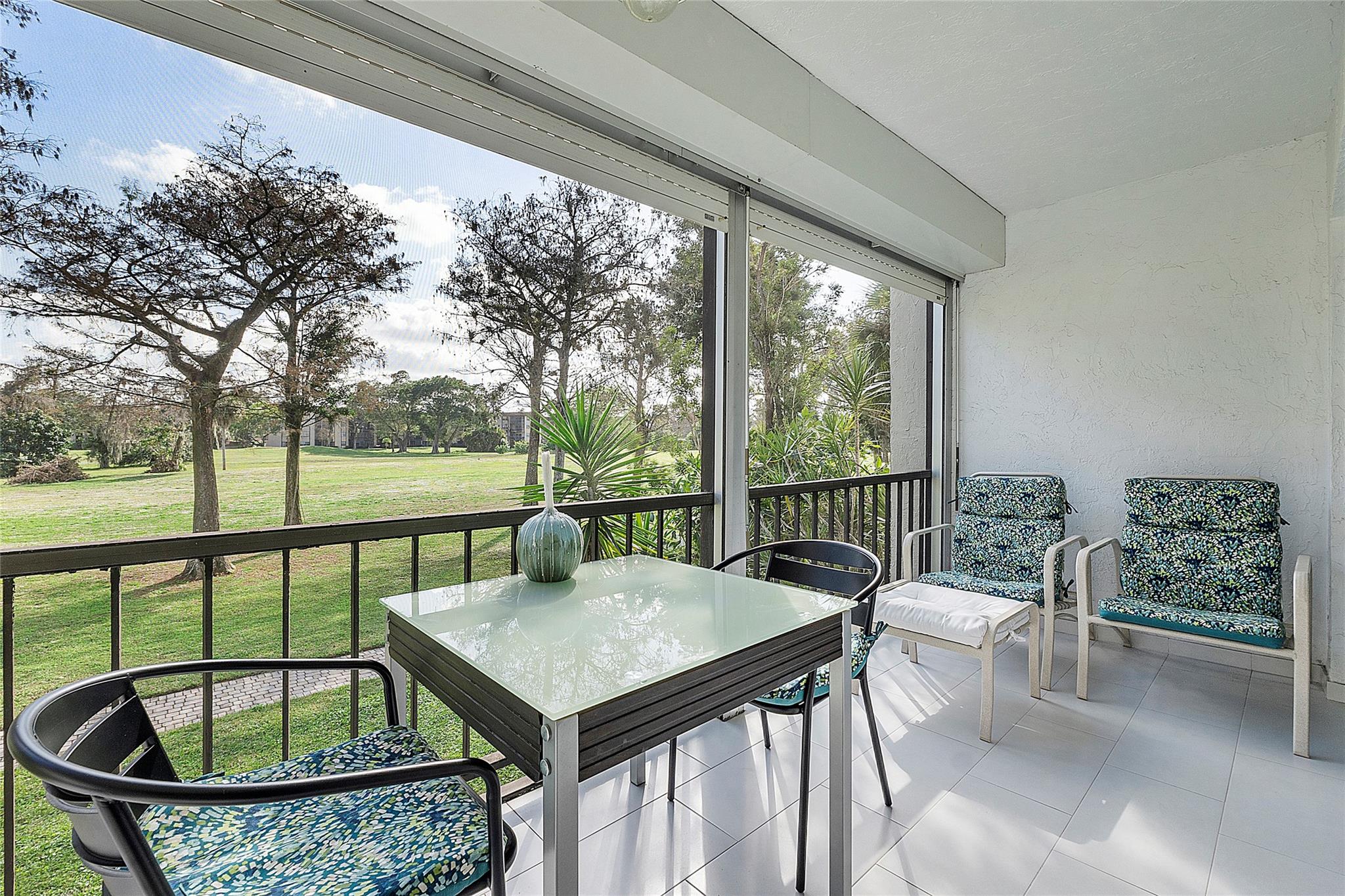 Fully furnished and updated 2-bedroom, 2-bathroom unit in a gated 55-plus community. in-unit washer and dryer, master bedroom offers two spacious walking closets, AC was replaced in 2024 and water heater in 2022. Inviting screened Florida room, providing a relaxing garden view. Residents can also take advantage of community amenities such as the pool, tiki hut, BBQ area, and gym. With its close proximity to shopping, transportation. 50 years inspection done, internet and cable include in monthly fees.