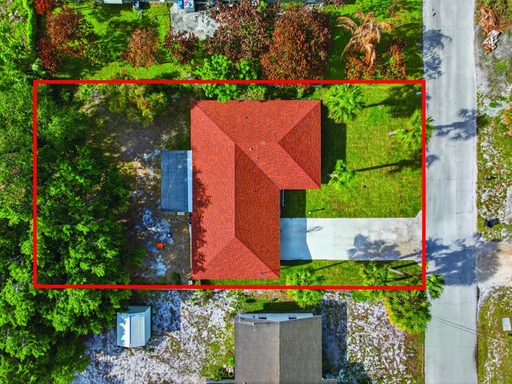 Photo of 1905 Colonial Road, Fort Pierce, FL 34950 (MLS # B26005134)