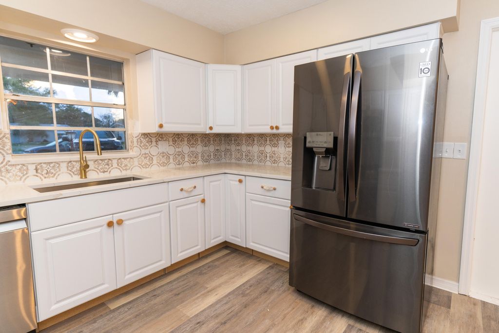 Photo of 1905 Colonial Road, Fort Pierce, FL 34950 (MLS # B26005134)