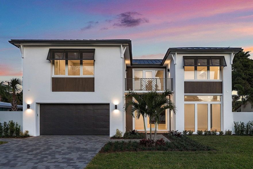 This cutting-edge brand new construction in the sought-after neighborhood of Lake Ida is ready for immediate occupancy. This stunning home constructed by the reputable local builder Edgewater features 4 bedrooms, 5 bathrooms, a chef's kitchen and an office. Total square footage is 3,914; living area is 3,260. There are many lovely finishes, a metal roof, impact windows, real wood floors, and a heated salt water pool and spa. Thermador appliances including a 60'' six burner gas range, two dishwashers, wall oven and microwave, and an over-sized refrigerator. Butler's pantry complete with wine cooler. Beautiful stone back patio with an inlaid wood ceiling. All this and just minutes to the beach, the entertainment of Downtown Delray and top private schools. Live a Floridian dream lifestyle!