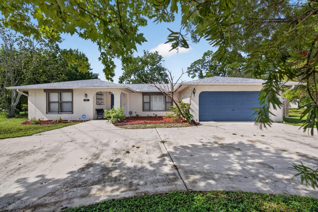 Photo of 102 SW EVANS Avenue, Port Saint Lucie, FL 34984 (MLS # B26080830)
