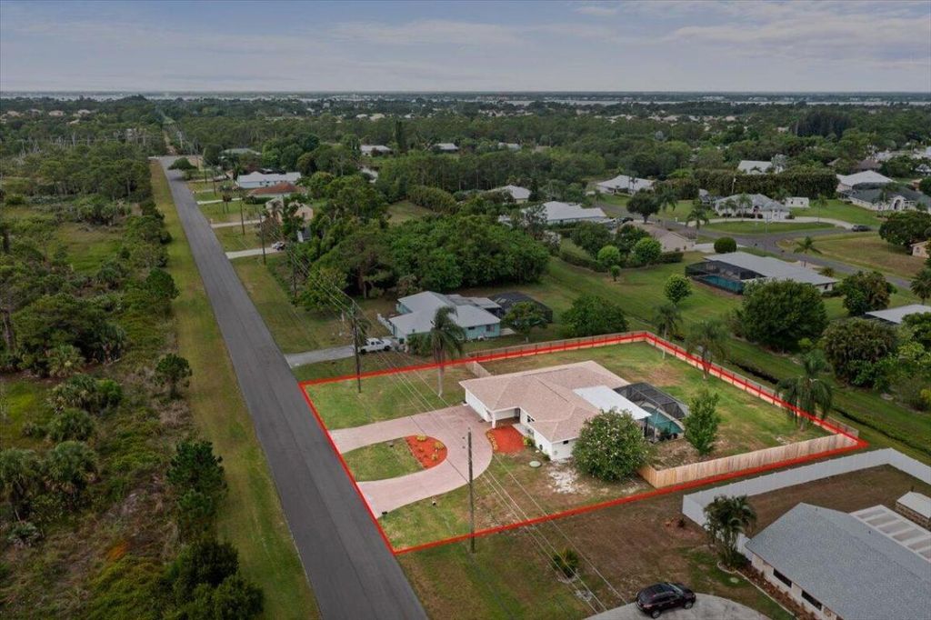 Photo of 2938 SE Bakersfield Street, Port Saint Lucie, FL 34952 (MLS # R10996707)