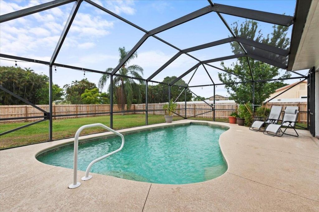 Photo of 2938 SE Bakersfield Street, Port Saint Lucie, FL 34952 (MLS # R10996707)