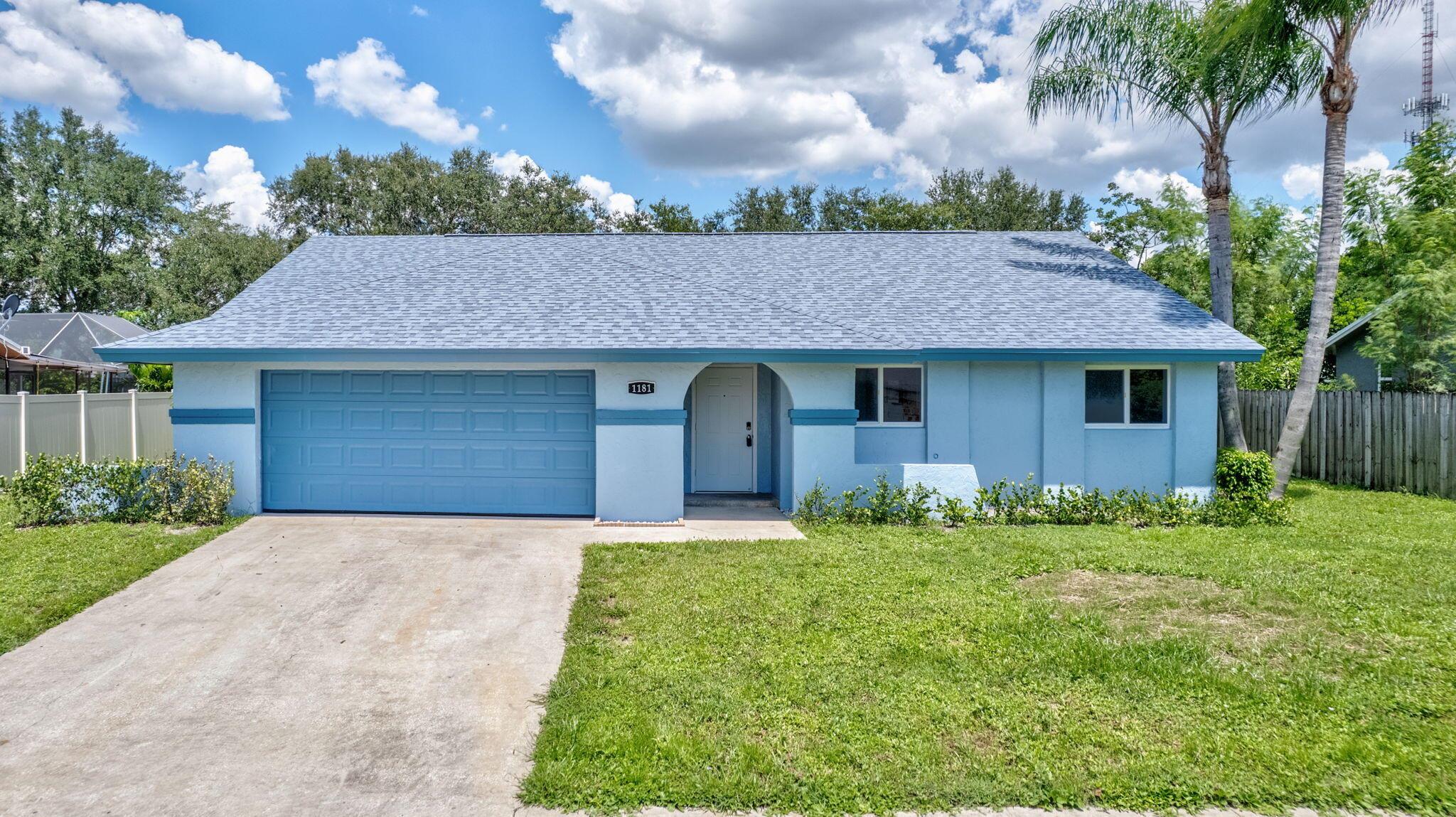 Completely remodeled, open concept, split floorplan, pool home welcomes you to established Wellington family neighborhood with No HOA! All new finishes & fixtures throughout! Lovely kitchen renovation with new ss appliances, quartz countertops, loads of white shaker cabinets for storage, sink disposal, & pendant lights over the eat-in peninsula. New LVP floors, interior doors & trim, interior & exterior paint, lighting & ceiling fans, refreshed closets and shelving. New roof, new irrigation system & pump w/water supplied by well, Impact windows & doors. All new bathrooms with beautiful wall tile, new vanities, toilets, showers. Primary bedroom features dual sink vanity and walk-in closet, while the two split br's share bath w/shower-tub combo. The barn-style door near entryway opens to a