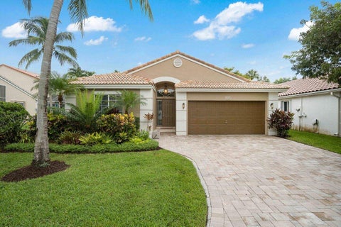 Photo of 660 NW 45th Avenue, Deerfield Beach, FL 33442 (MLS # B26038101)