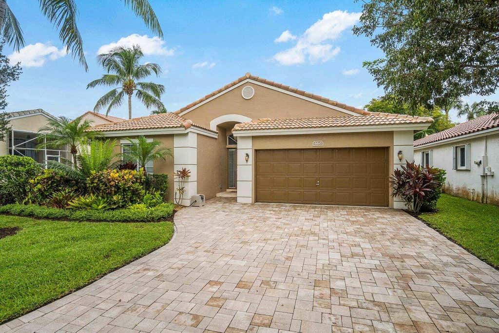 Photo of 660 NW 45th Avenue, Deerfield Beach, FL 33442 (MLS # B26038101)