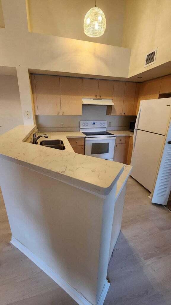 Photo of 4180 San Marino Boulevard #105, West Palm Beach, FL 33409 (MLS # R10973259)