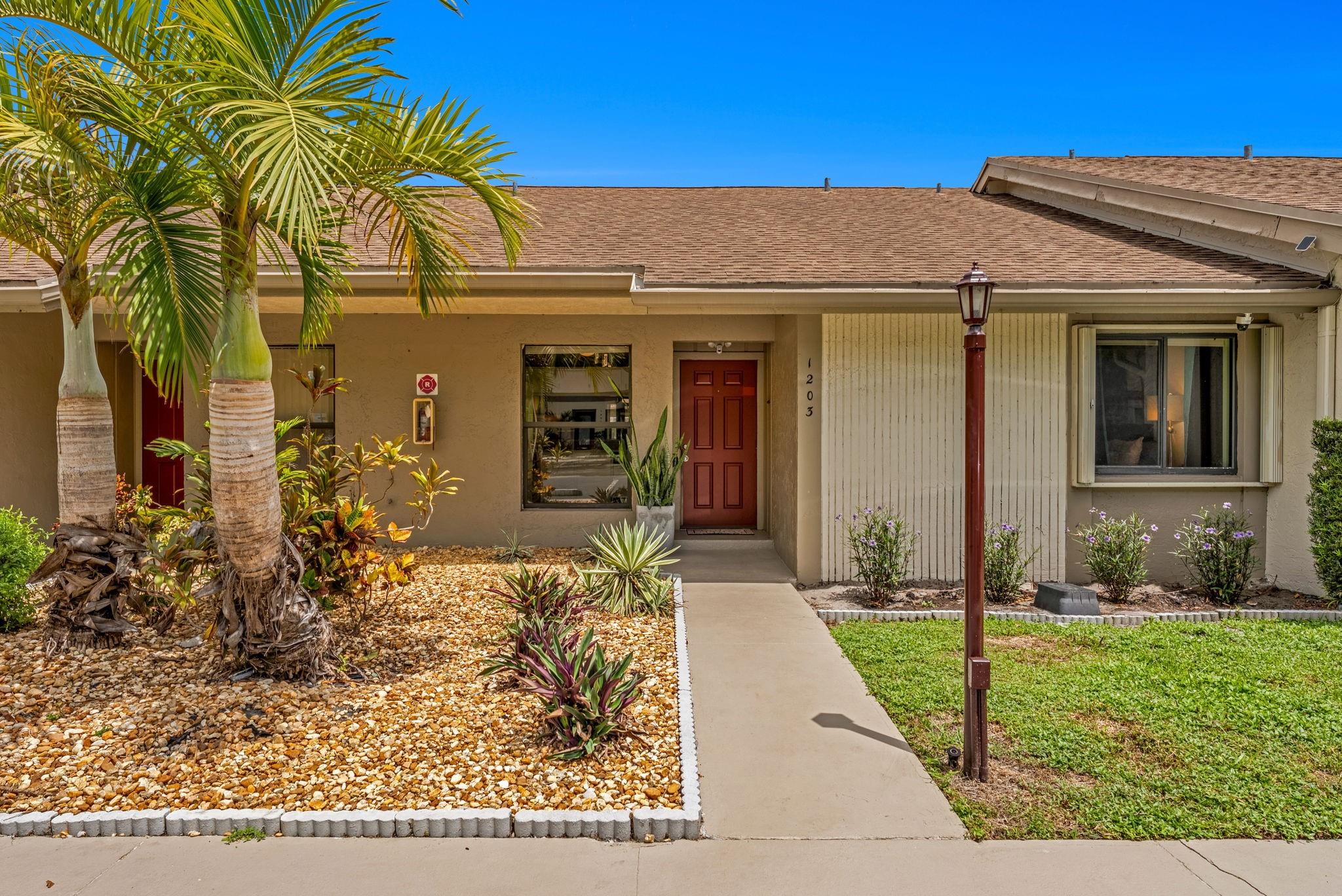 "Say Hello to a Good Buy" in Pines West – a sought-after gated community in Oakland Park. This one-story villa is filled with perks: vaulted ceilings, split-bedroom floor plan, spacious primary suite with walk-in closet, large private patio with serene garden views, full-size washer/dryer, and NEW central A/C. HOA offers exceptional value with full reserves- no special assessment, high-speed internet, cable, insurance, & building exterior & roof maintenance (roof replaced in 2017). Amenities include a heated pool, huge private gym, tennis court, walking trails, and plenty of guest parking. Pet-friendly (up to 2 pets). All ages community. Nearby highways, shopping, dining, and minutes to the beach. Strong reserves allow financing with as little as 10% down. Act Fast - This One Won't Last