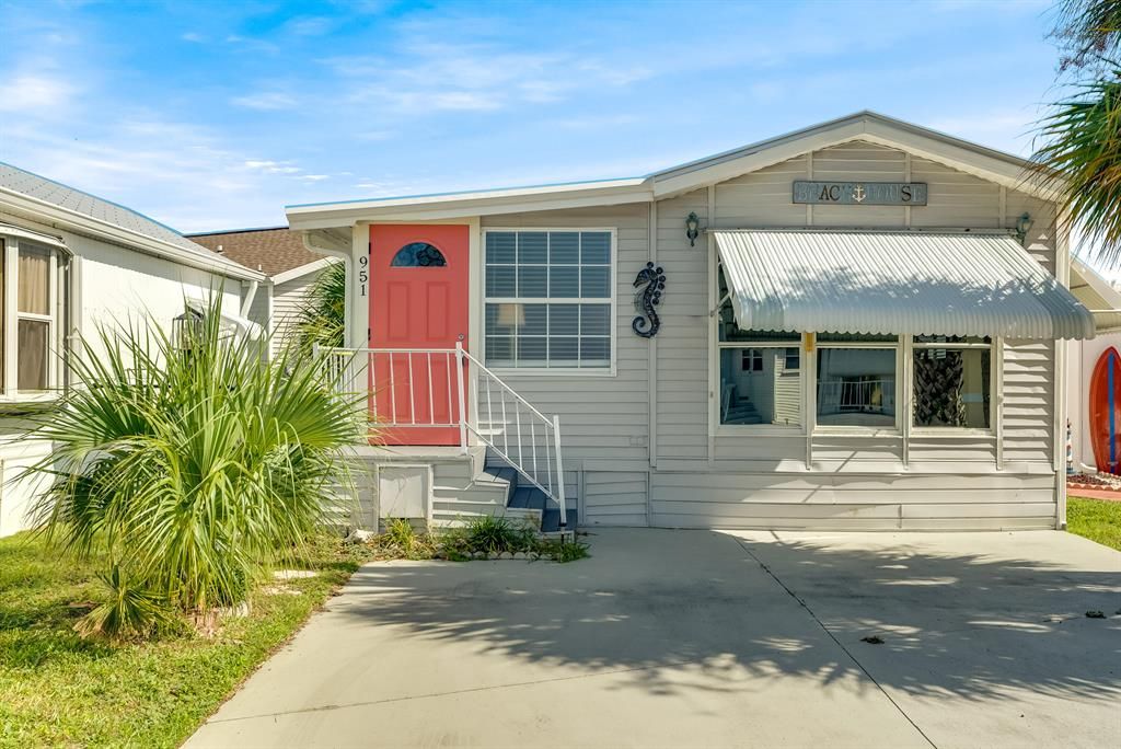 Photo of 951 Nettles Boulevard, Jensen Beach, FL 34957 (MLS # R10851309)