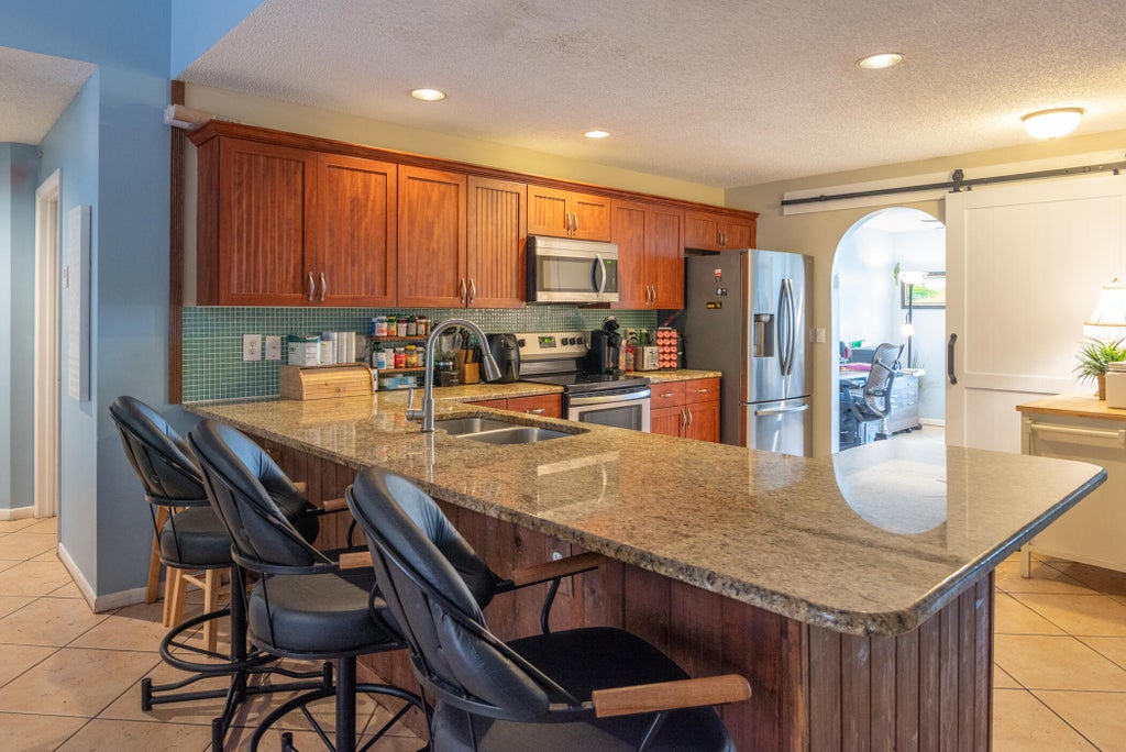 Photo of 7598 Briar Cliff Circle, Lake Worth, FL 33467 (MLS # R10936415)