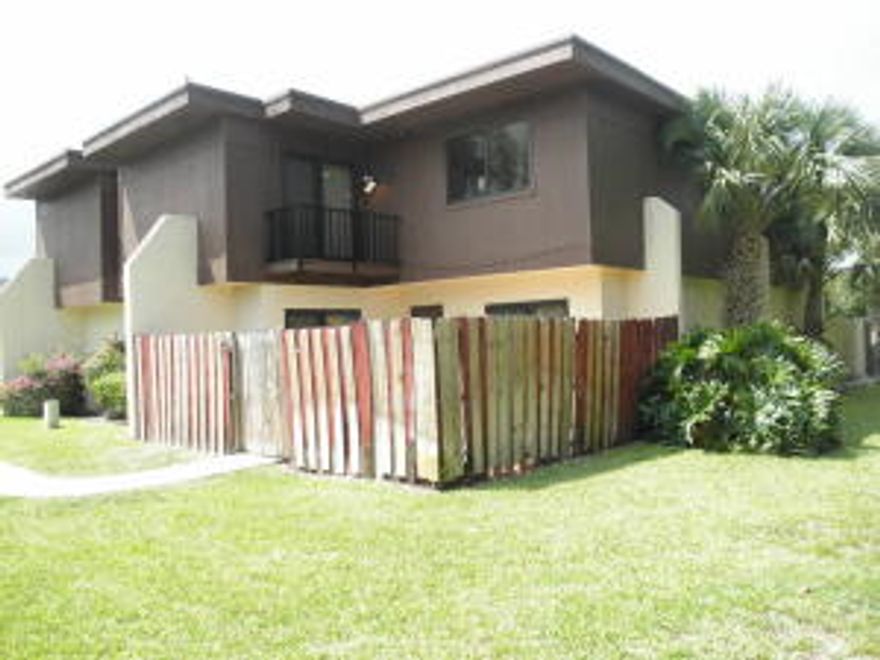 Country Style Town-home with over 1500 square feet of living area, that backs up to large open green-space. All tile on the first floor, tiled kitchen counters and back-splash, service counter into dining area and privacy fenced patio.  NO PETS