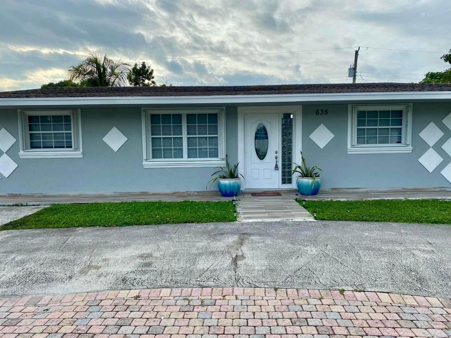 This beautiful property INCLUDES ALL UTILITIES  (water, electricity, internet, and landscaping). This lovely home features 1,900 square feet, 3 bedrooms, and 2 bathrooms. It includes a terrace with an attached laundry area and a spacious patio. The roof was newly installed in 2024. There is an open garage and parking space for a total of 6 cars. Located just 5 minutes from the Turnpike, the airport, Home Depot, Publix, Walmart, schools, and much more. Don't miss this opportunity—it offers every convenience all in one place!