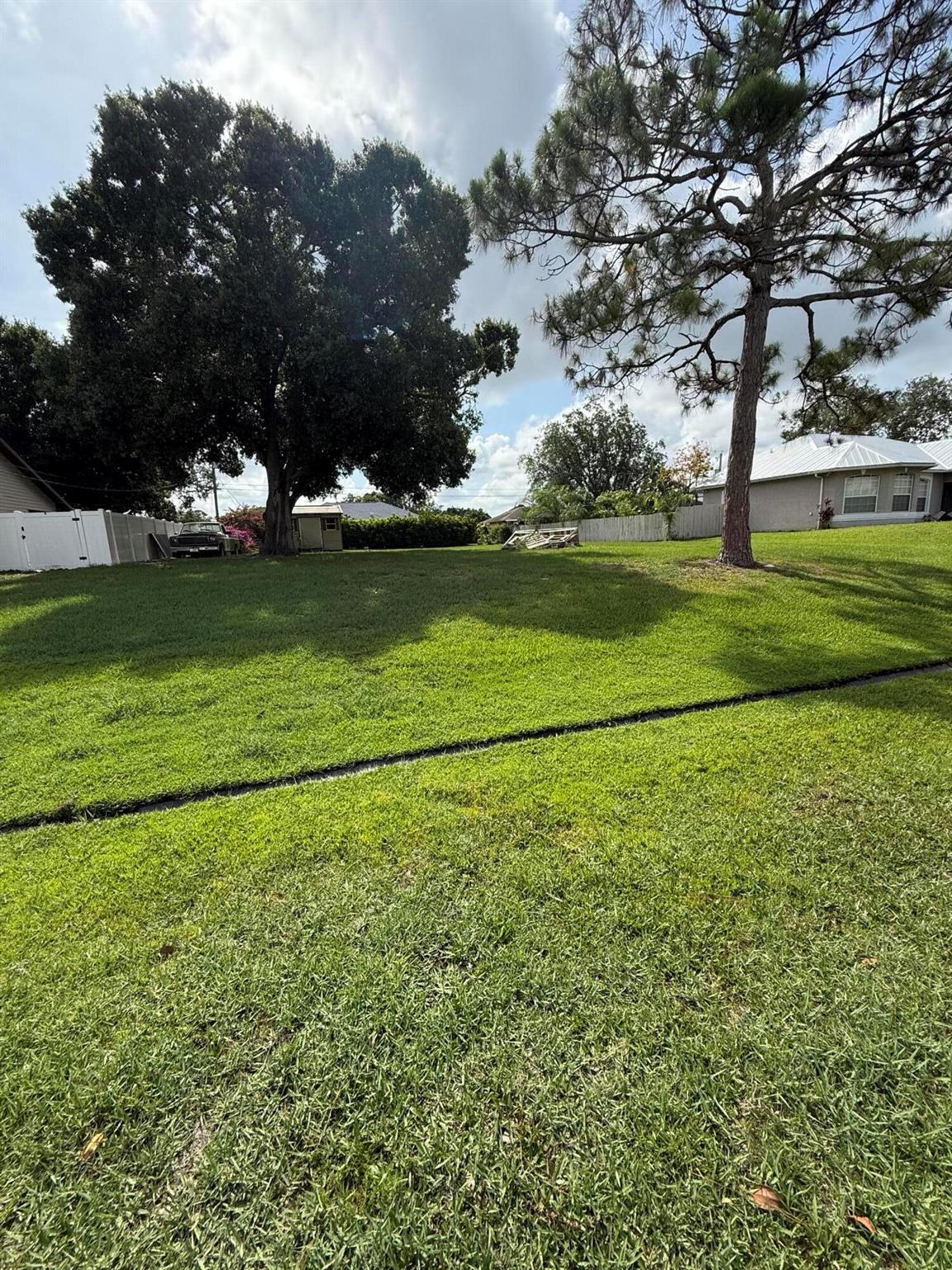 Build your dream home on this prime vacant lot located on SW Beauregard St in the heart of Port St. Lucie. Surrounded by well-kept homes, this spacious lot offers a peaceful, residential setting with no HOA. Enjoy easy access to I-95, shopping, dining, schools, and parks. Whether you're a builder, investor, or future homeowner, this is a fantastic opportunity in one of the fastest-growing areas on the Treasure Coast. Don't miss your chance to own a piece of Port St. Lucie!