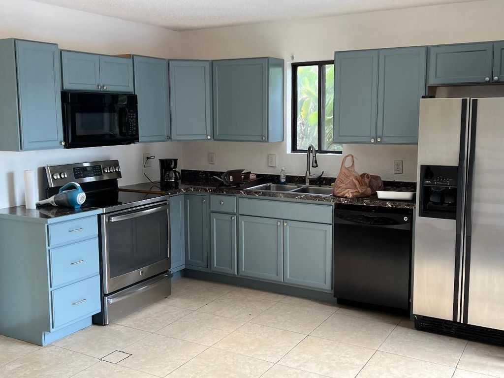 Photo of 6003 Waterview Circle, Palm Springs, FL 33461 (MLS # B26006424)